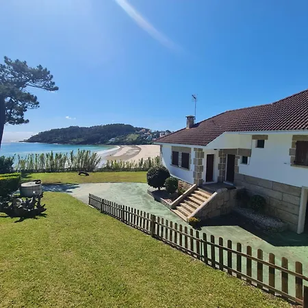 En Sanxenxo, Encima De La Playa Canelas